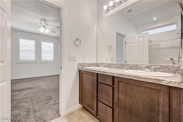 138 Red Sandstone Ave, North Las Vegas, NV 89031 - bathroom featuring double vanity, ceiling fan, healthy amount of natural light, and a shower