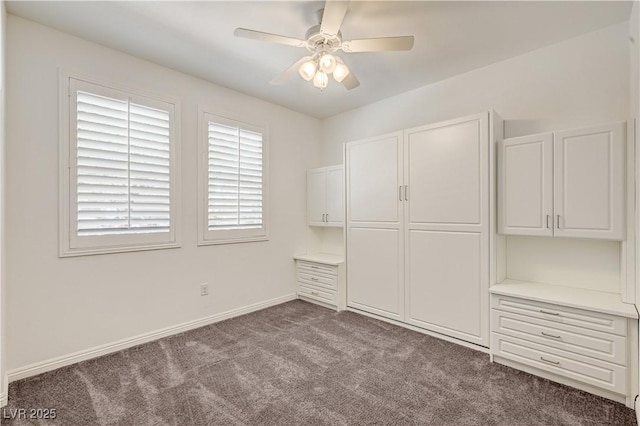 138 Red Sandstone Ave, North Las Vegas, NV 89031 - unfurnished bedroom featuring dark carpet and a ceiling fan