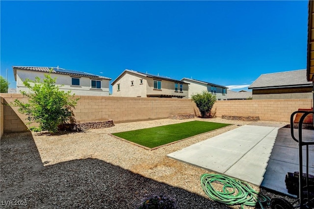 138 Red Sandstone Ave, North Las Vegas, NV 89031 - fenced backyard with a patio area