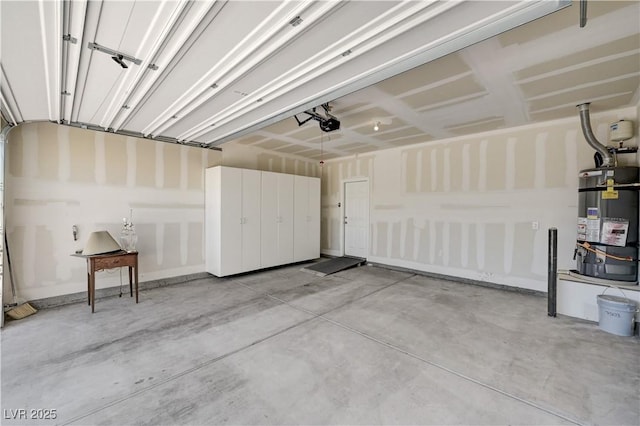 138 Red Sandstone Ave, North Las Vegas, NV 89031 - garage with strapped water heater and a garage door opener