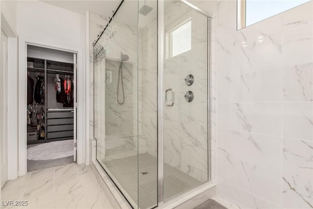 3244 Timorasso Ave, Henderson, NV 89044 - bathroom with a marble finish shower, marble finish floors, and a walk in closet