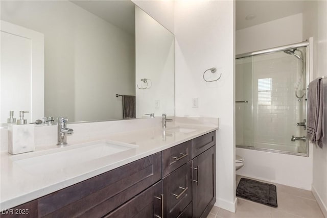 3244 Timorasso Ave, Henderson, NV 89044 - bathroom with double vanity, bath / shower combo with glass door, and tile patterned floors