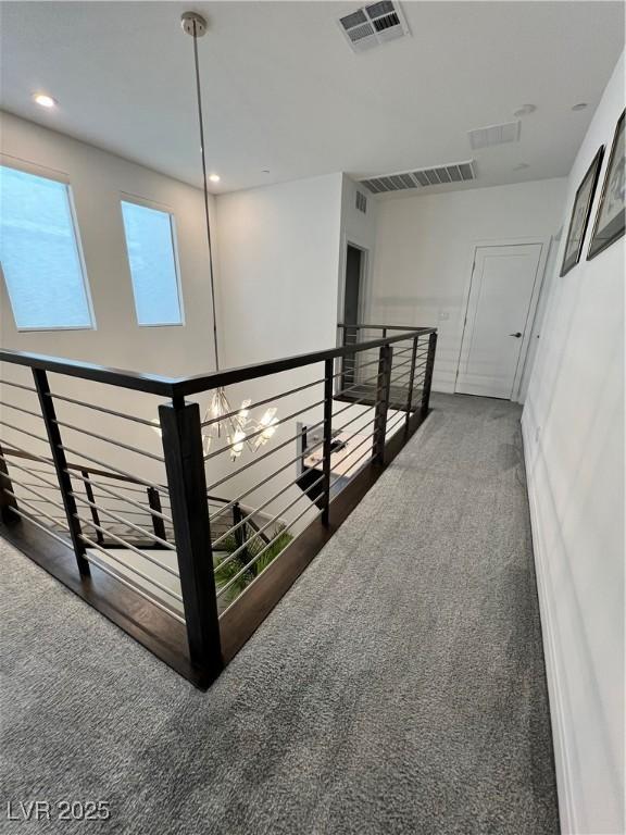 3244 Timorasso Ave, Henderson, NV 89044 - hallway featuring carpet floors and an upstairs landing