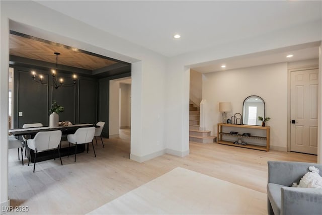 516 Pinnacle Heights Ln, Las Vegas, NV 89144 - living room featuring stairs, wood finished floors, a chandelier, and recessed lighting
