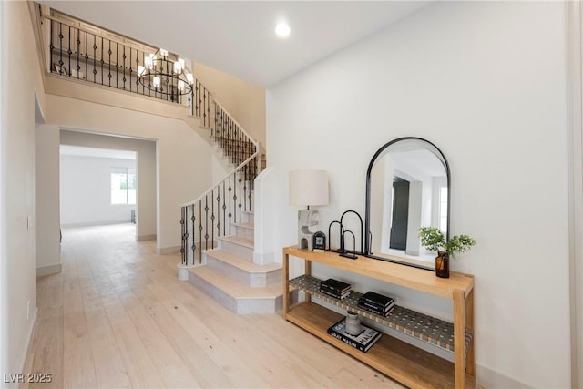 516 Pinnacle Heights Ln, Las Vegas, NV 89144 - foyer with a chandelier, hardwood / wood-style flooring, stairway, and recessed lighting