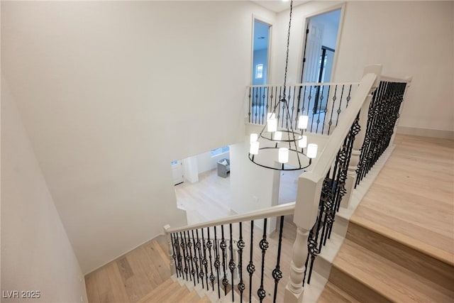 516 Pinnacle Heights Ln, Las Vegas, NV 89144 - stairs featuring wood finished floors