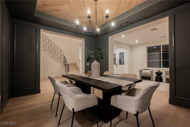 516 Pinnacle Heights Ln, Las Vegas, NV 89144 - dining area with stairway, a chandelier, light wood-type flooring, and recessed lighting