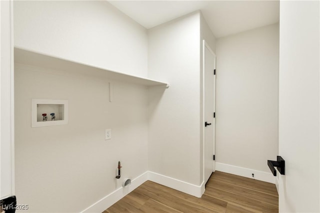 9349 Lakefront Color St, Las Vegas, NV 89178 - laundry room with washer hookup, wood finished floors, and gas dryer hookup