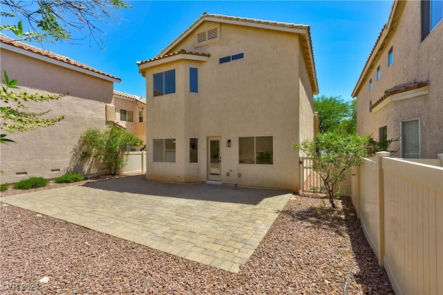 9349 Lakefront Color St, Las Vegas, NV 89178 - back of house with stucco siding and a patio