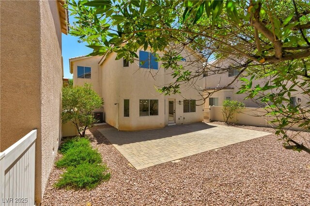 9349 Lakefront Color St, Las Vegas, NV 89178 - rear view of property with stucco siding and a patio area