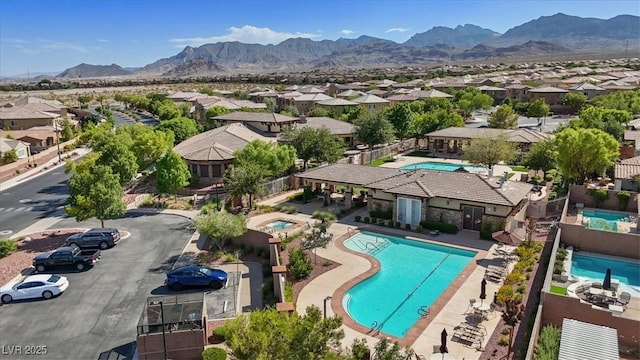 10645 Mount Jefferson Ave, Las Vegas, NV 89166 - community pool featuring a residential view and a mountain view