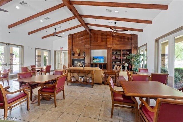 10645 Mount Jefferson Ave, Las Vegas, NV 89166 - dining space featuring french doors, ceiling fan, light tile patterned flooring, plenty of natural light, and recessed lighting