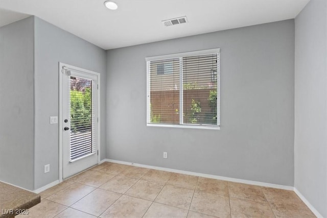 10645 Mount Jefferson Ave, Las Vegas, NV 89166 - empty room featuring light tile patterned flooring and baseboards