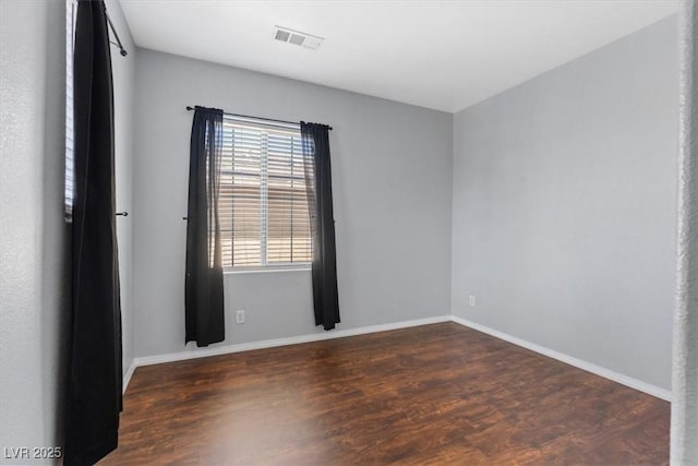 10645 Mount Jefferson Ave, Las Vegas, NV 89166 - empty room featuring wood finished floors and baseboards