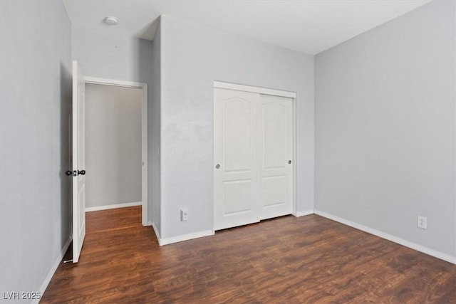 10645 Mount Jefferson Ave, Las Vegas, NV 89166 - unfurnished bedroom featuring wood finished floors and a closet
