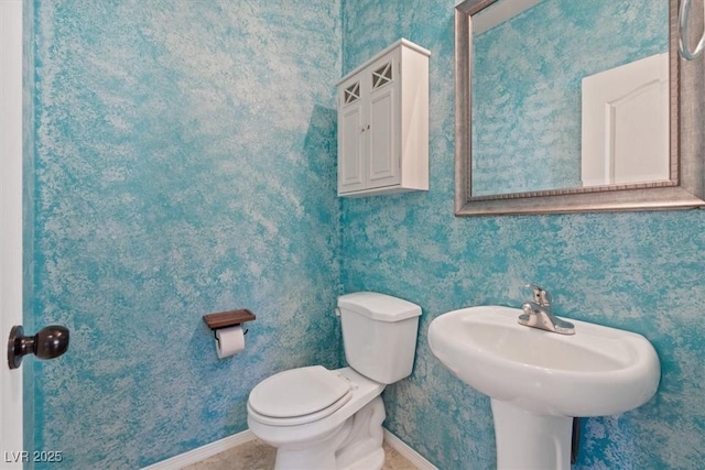 10645 Mount Jefferson Ave, Las Vegas, NV 89166 - bathroom with toilet and baseboards