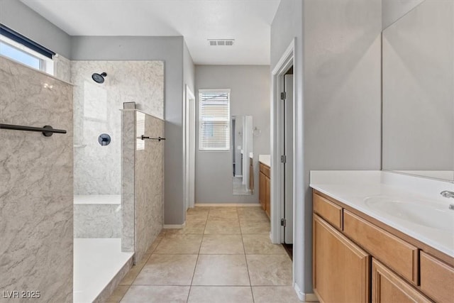 10645 Mount Jefferson Ave, Las Vegas, NV 89166 - bathroom featuring vanity, walk in shower, and tile patterned flooring