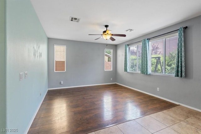 10645 Mount Jefferson Ave, Las Vegas, NV 89166 - empty room with ceiling fan and wood finished floors