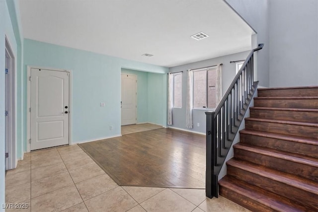 10645 Mount Jefferson Ave, Las Vegas, NV 89166 - entryway featuring stairs and light tile patterned flooring