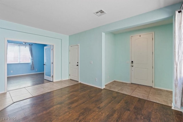 10645 Mount Jefferson Ave, Las Vegas, NV 89166 - spare room featuring wood finished floors and baseboards