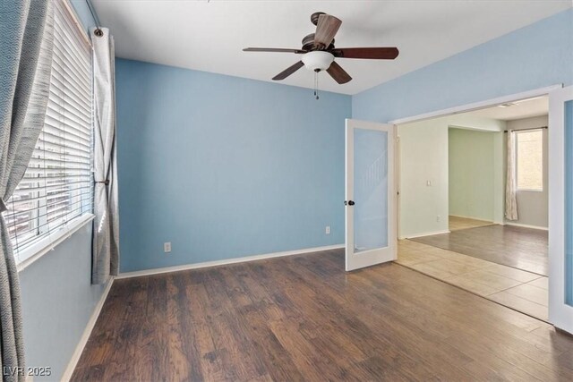 10645 Mount Jefferson Ave, Las Vegas, NV 89166 - unfurnished bedroom featuring french doors, wood finished floors, and a ceiling fan