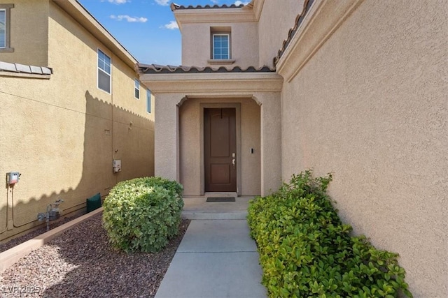 10645 Mount Jefferson Ave, Las Vegas, NV 89166 - entrance to property featuring stucco siding and a tiled roof