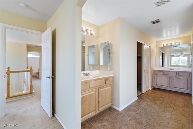 3613 Rubio Sun Ave, North Las Vegas, NV 89081 - full bath featuring two vanities and tile patterned floors