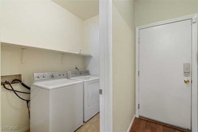 3613 Rubio Sun Ave, North Las Vegas, NV 89081 - washroom with washer and clothes dryer and light wood-type flooring