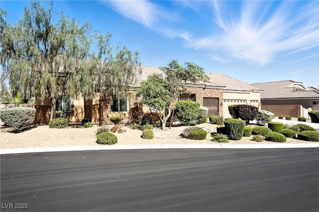 7330 Silent Water Way, Las Vegas, NV 89149 - view of front of home with a garage