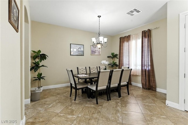 7330 Silent Water Way, Las Vegas, NV 89149 - dining space featuring a chandelier and baseboards