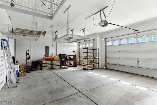 7330 Silent Water Way, Las Vegas, NV 89149 - garage with electric panel and a garage door opener