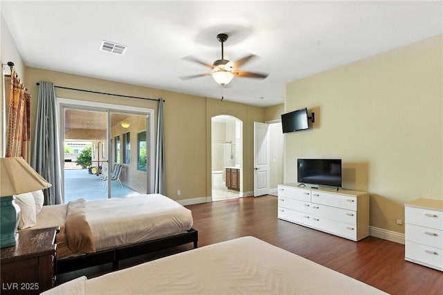7330 Silent Water Way, Las Vegas, NV 89149 - bedroom with access to outside, arched walkways, wood finished floors, connected bathroom, and a ceiling fan