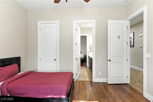 7330 Silent Water Way, Las Vegas, NV 89149 - bedroom with wood finished floors and ceiling fan