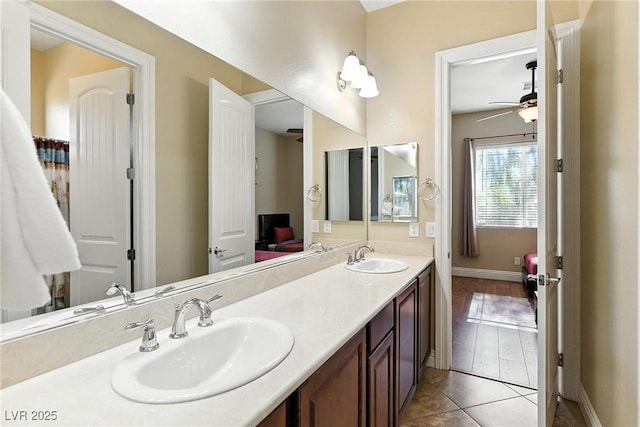 7330 Silent Water Way, Las Vegas, NV 89149 - full bathroom with double vanity, a ceiling fan, and tile patterned floors