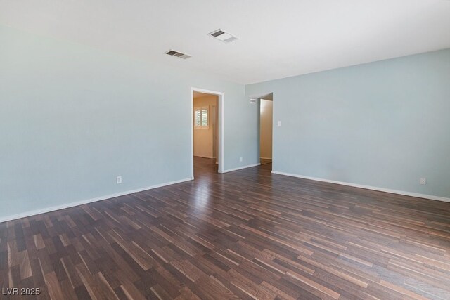 7221 Alta Dr, Las Vegas, NV 89145 - unfurnished room featuring dark wood-style floors and baseboards