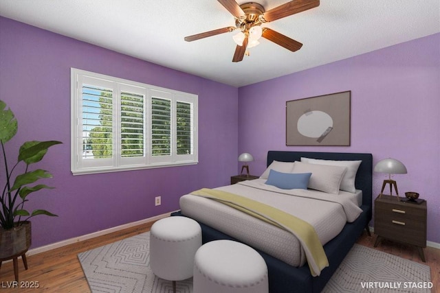 7221 Alta Dr, Las Vegas, NV 89145 - bedroom featuring wood finished floors and a ceiling fan