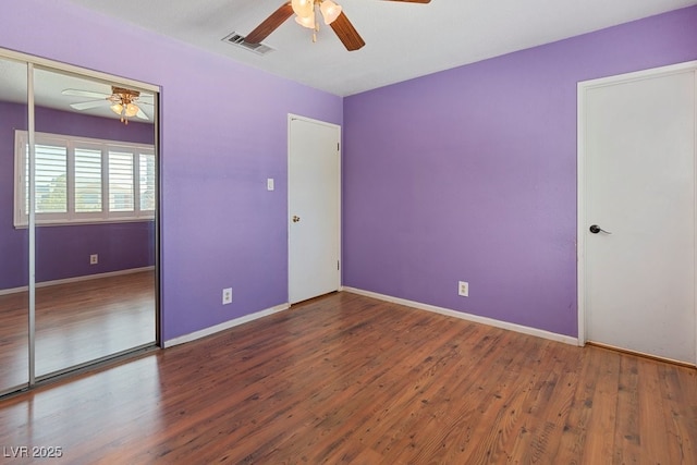 7221 Alta Dr, Las Vegas, NV 89145 - unfurnished bedroom featuring a closet, wood finished floors, and ceiling fan