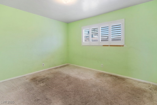 7221 Alta Dr, Las Vegas, NV 89145 - carpeted spare room featuring baseboards