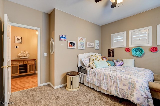 109 N Buteo Woods Ln, Las Vegas, NV 89144 - carpeted bedroom with baseboards and a ceiling fan