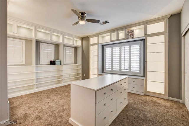 109 N Buteo Woods Ln, Las Vegas, NV 89144 - walk in closet featuring carpet and ceiling fan