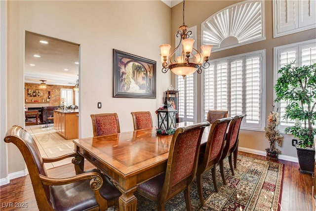 109 N Buteo Woods Ln, Las Vegas, NV 89144 - dining space featuring wood finished floors, a chandelier, and recessed lighting