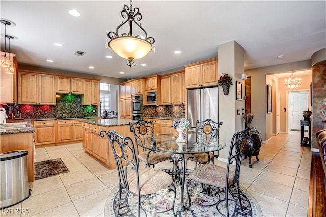 109 N Buteo Woods Ln, Las Vegas, NV 89144 - kitchen featuring light tile patterned floors, backsplash, dark stone countertops, a kitchen island, and recessed lighting