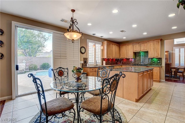 109 N Buteo Woods Ln, Las Vegas, NV 89144 - dining area with healthy amount of natural light, recessed lighting, and light tile patterned floors