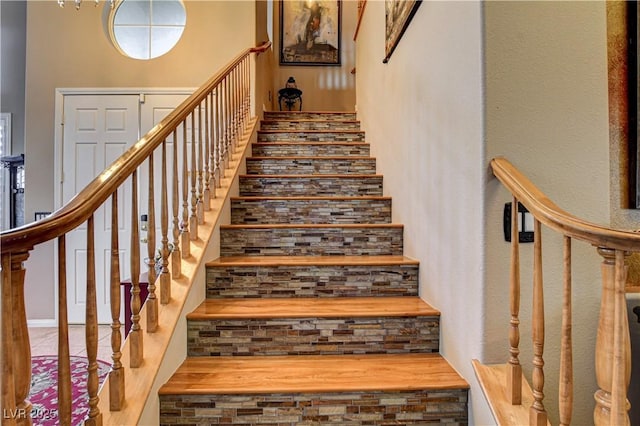 109 N Buteo Woods Ln, Las Vegas, NV 89144 - stairway with a high ceiling
