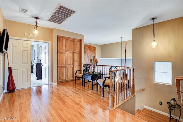 109 N Buteo Woods Ln, Las Vegas, NV 89144 - foyer entrance featuring light wood finished floors and baseboards