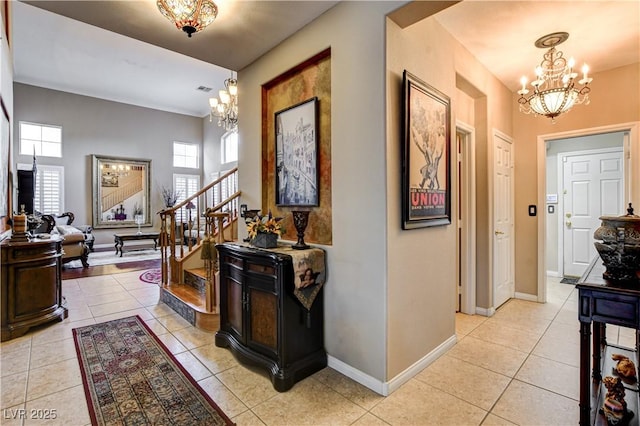 109 N Buteo Woods Ln, Las Vegas, NV 89144 - foyer featuring a chandelier, light tile patterned floors, and stairway