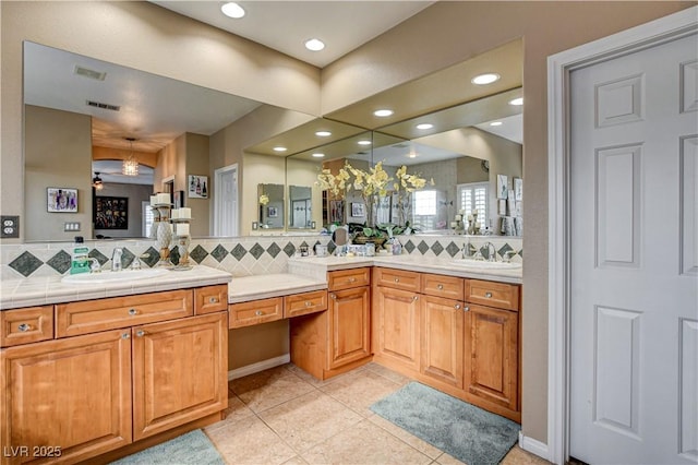 109 N Buteo Woods Ln, Las Vegas, NV 89144 - full bathroom featuring tasteful backsplash, vanity, recessed lighting, and tile patterned floors