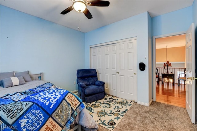 109 N Buteo Woods Ln, Las Vegas, NV 89144 - carpeted bedroom with a closet and a ceiling fan