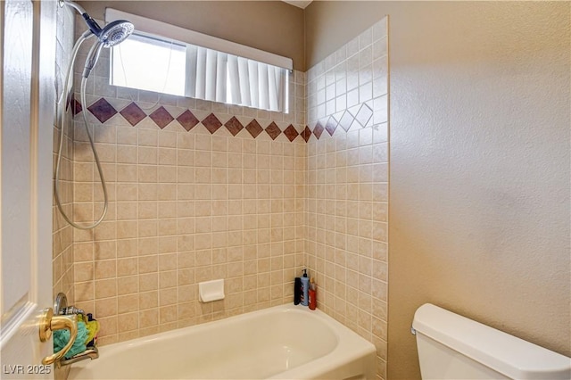 109 N Buteo Woods Ln, Las Vegas, NV 89144 - bathroom with washtub / shower combination and a textured wall