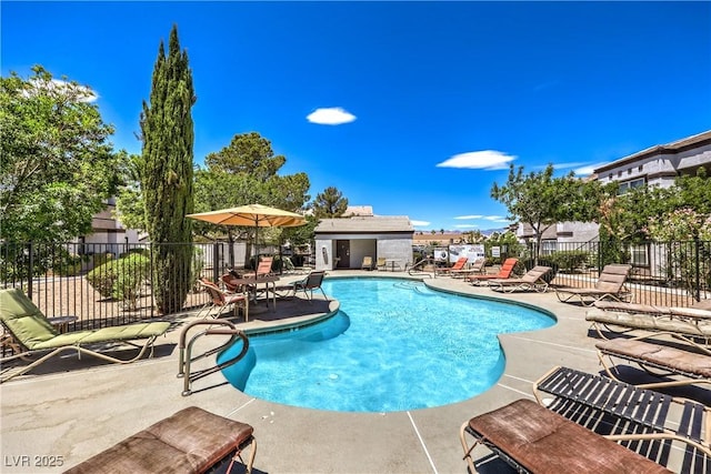 7255 W Sunset Rd Unit 1099, Las Vegas, NV 89113 - community pool with a patio area